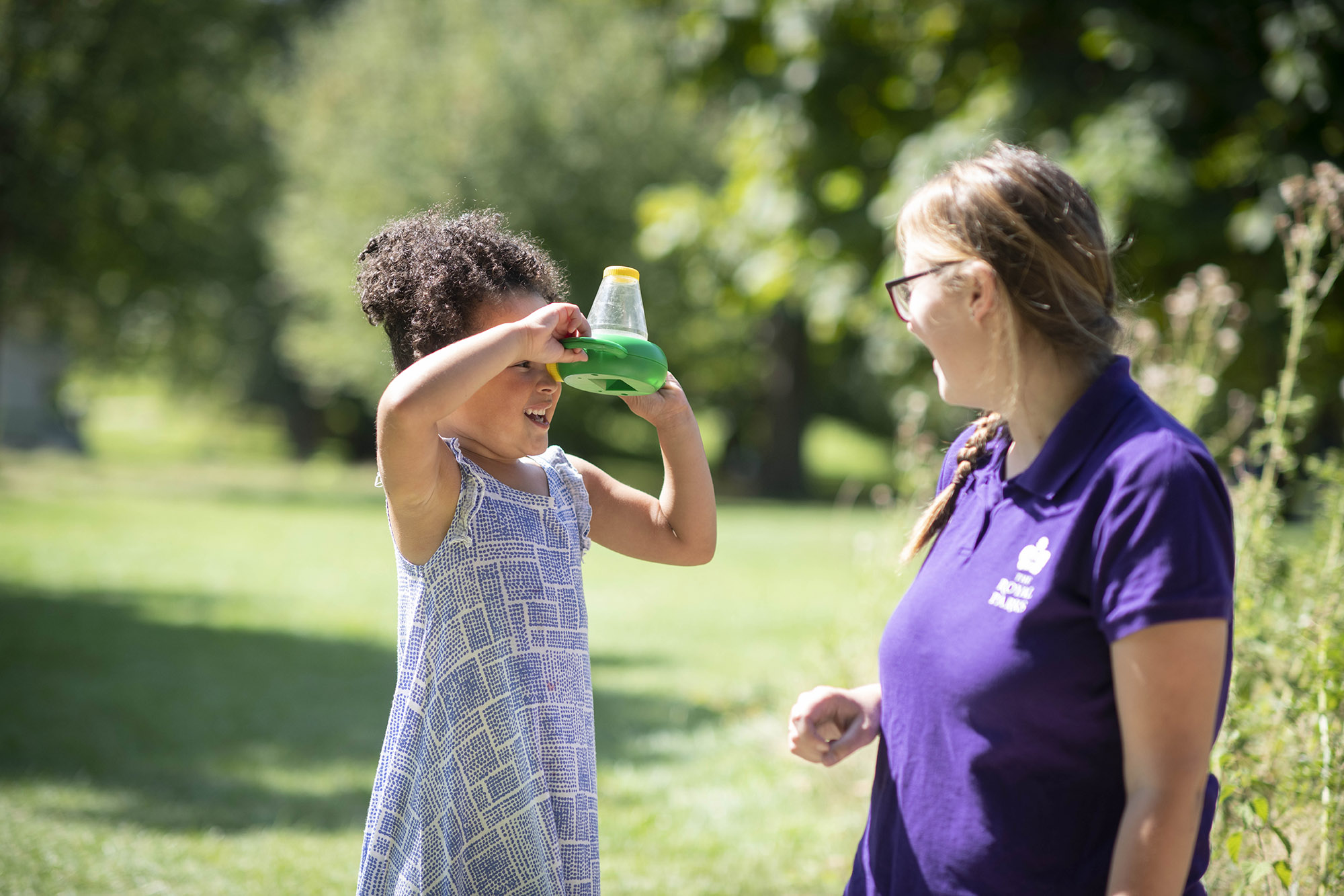 A young girl learning about nature