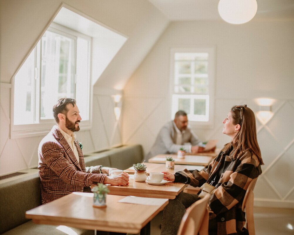 Diners at the tables inside the Ignatius Sancho Café