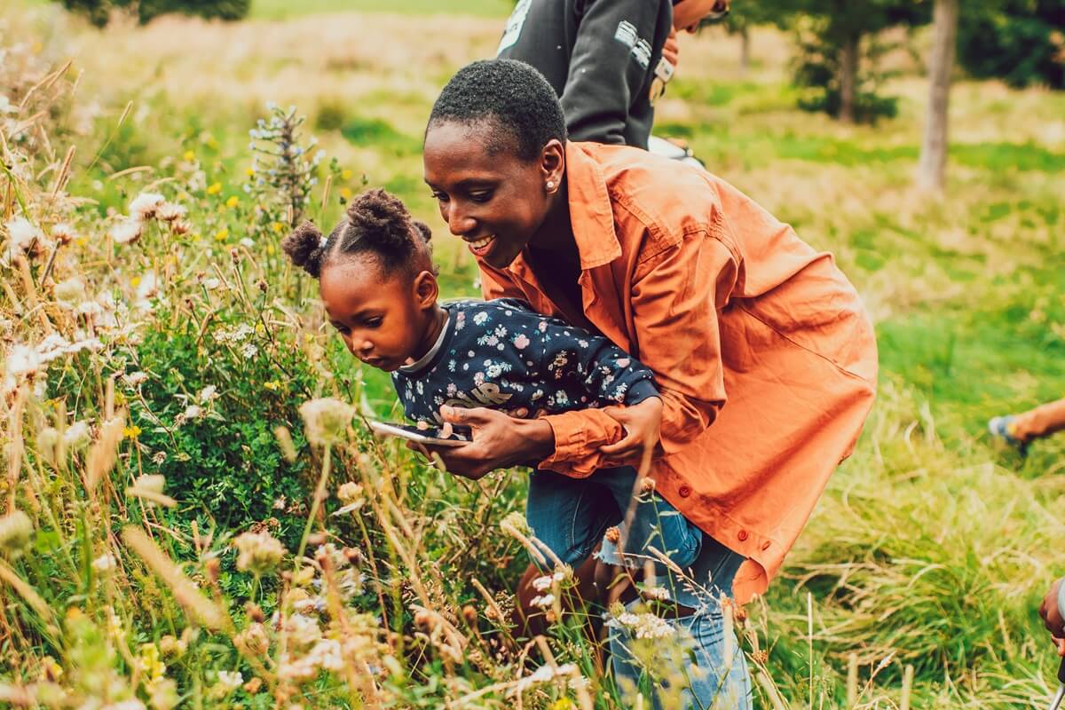 mother and child exploring nature