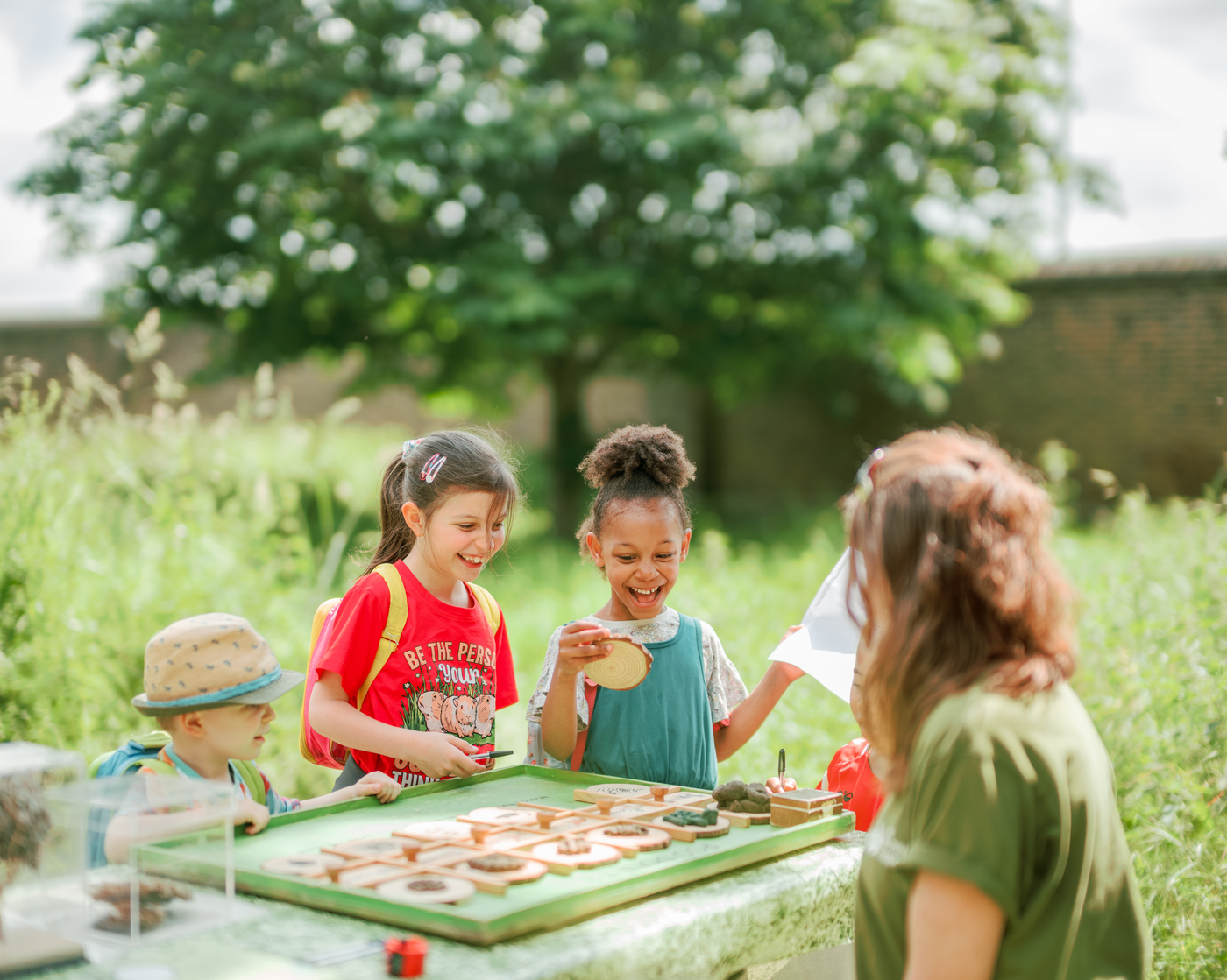 Children playing a quiz game outdoors