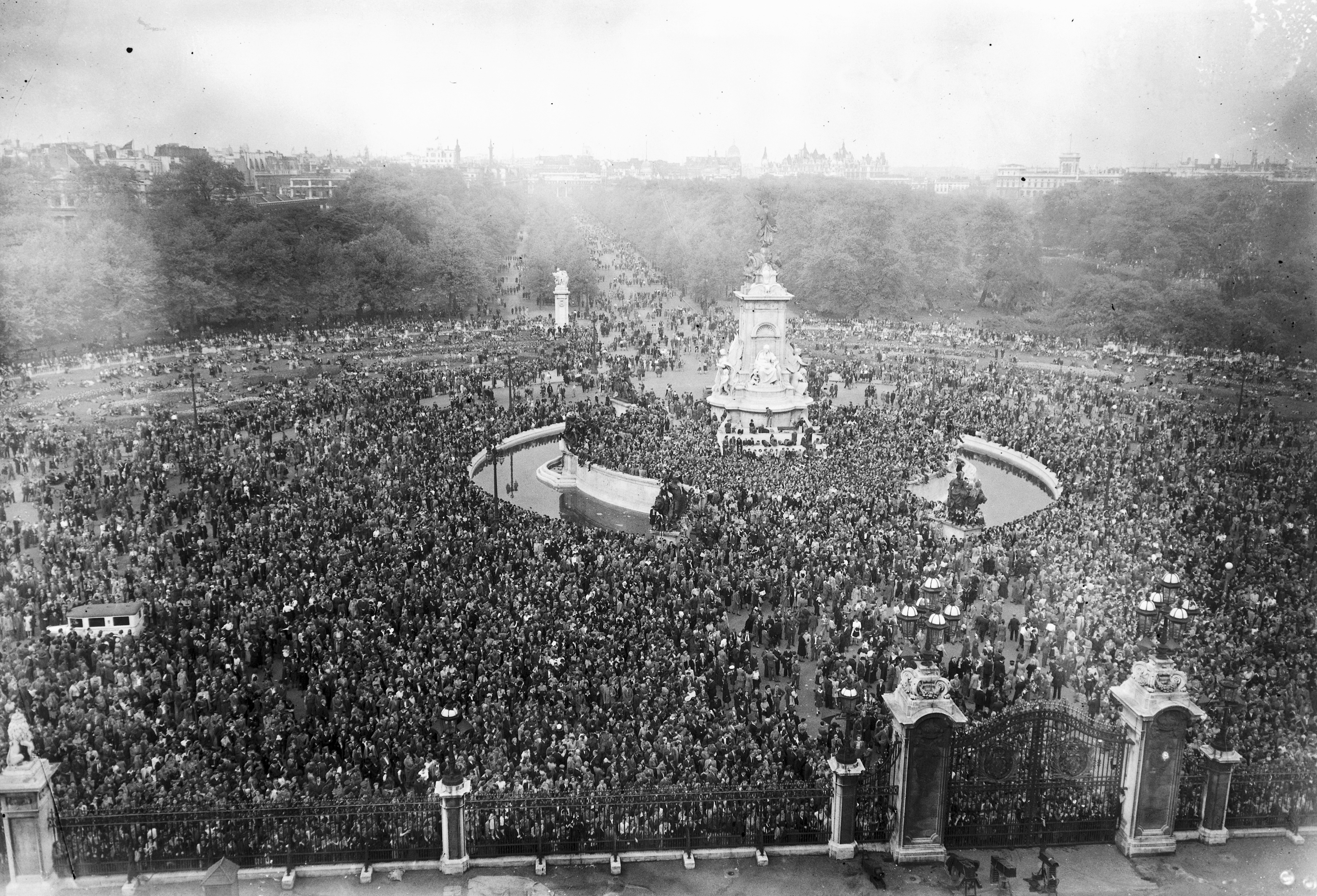 Crowds celebrate VE Day outside Buckingham Palace 