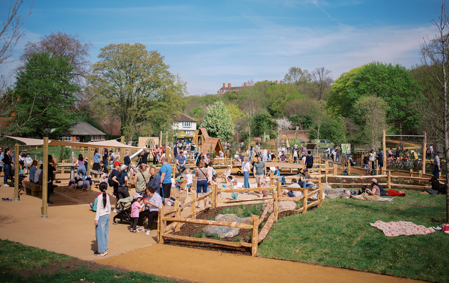 A busy playground on a sunny spring day