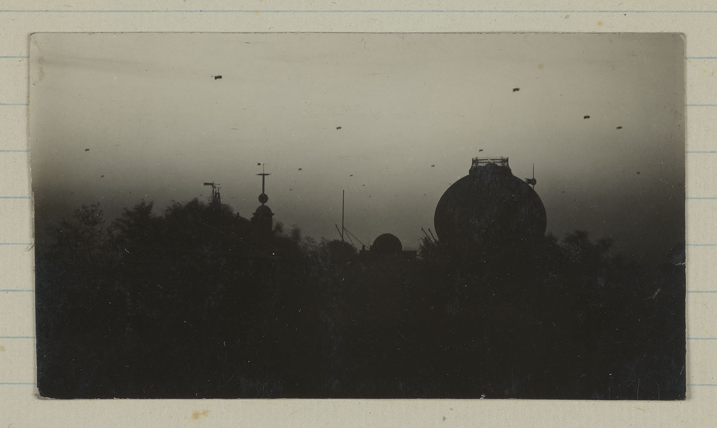 Black and white photograph showing Second World War barrage balloons over Greenwich Park
