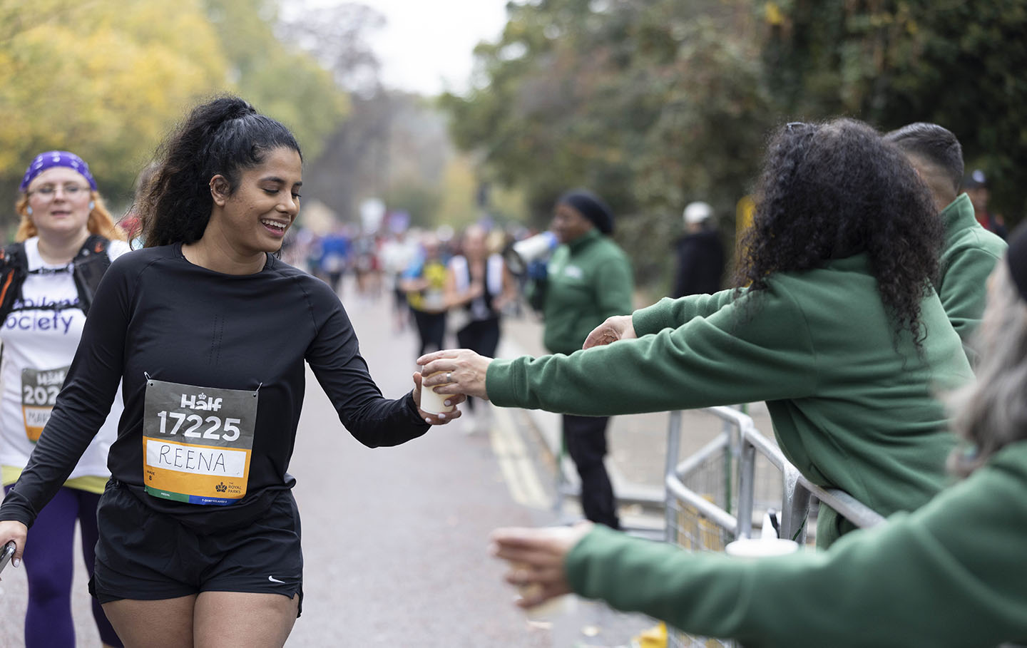 Half Marathon volunteers handing out water to runners