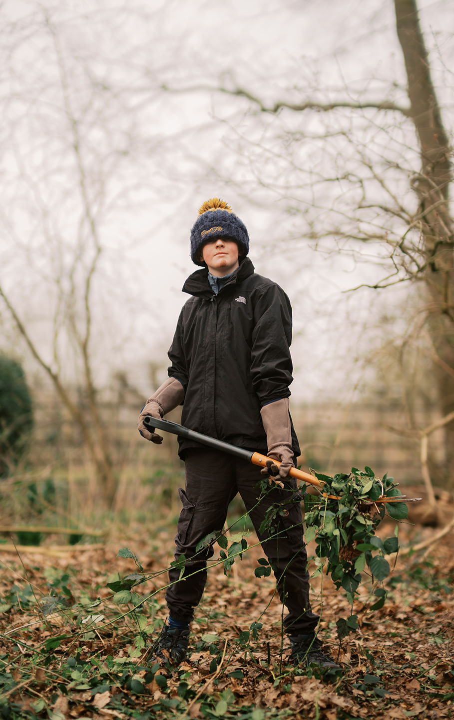 Green Futures student holding a garden fork