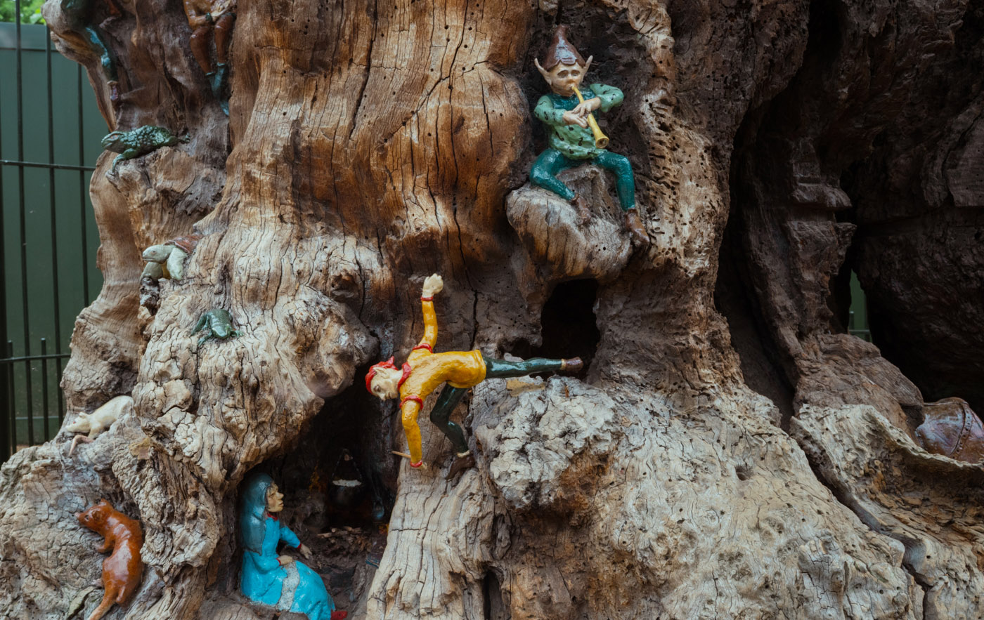 Carved characters of the Elfin Oak