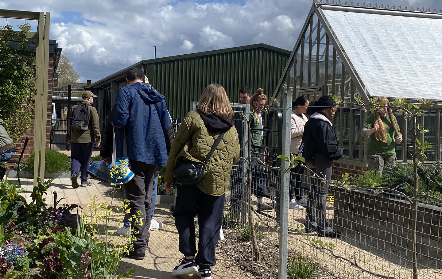 Group of visitors in the Ignatius Sancho community kitchen garden