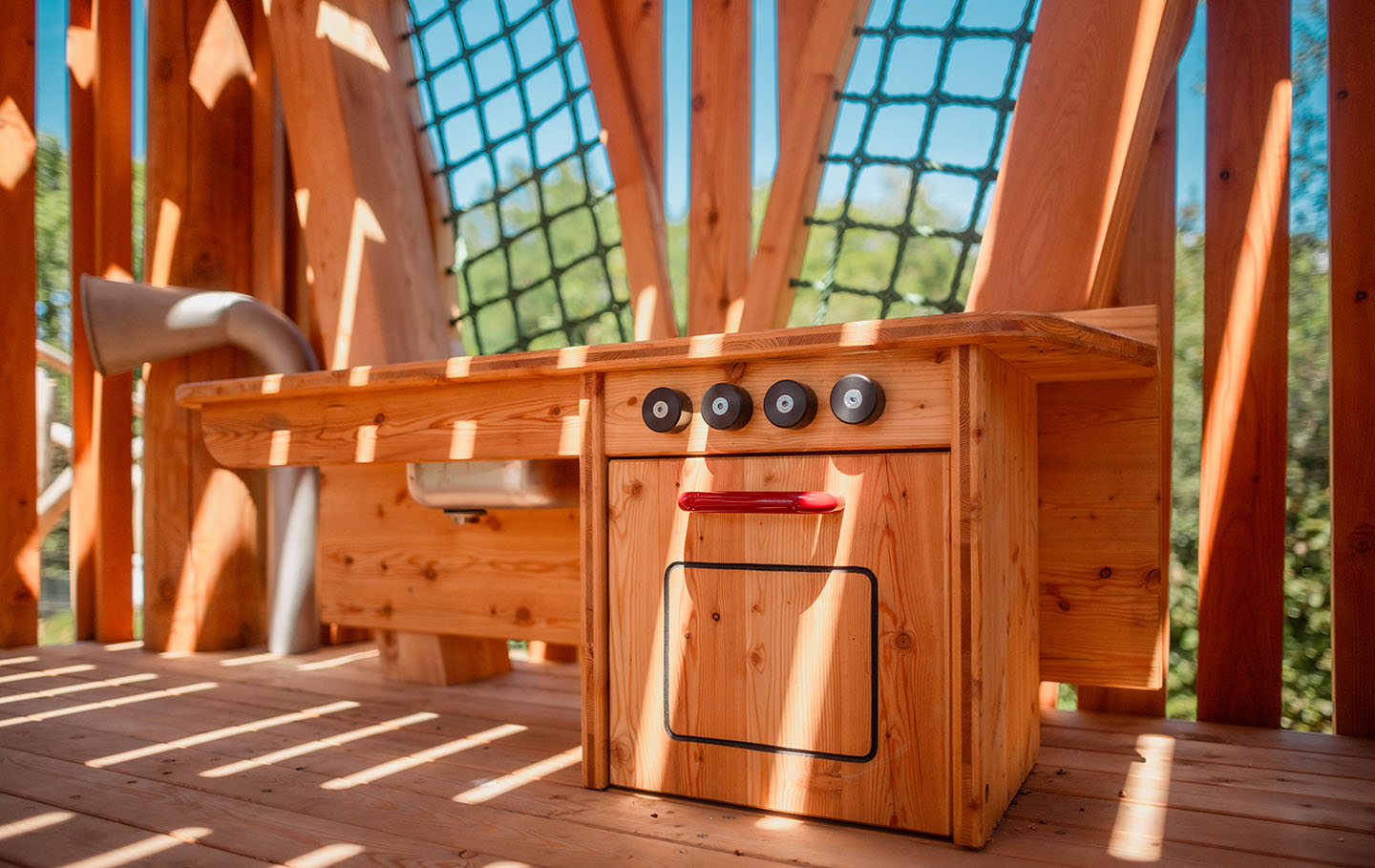 Play kitchen inside the new treehouse