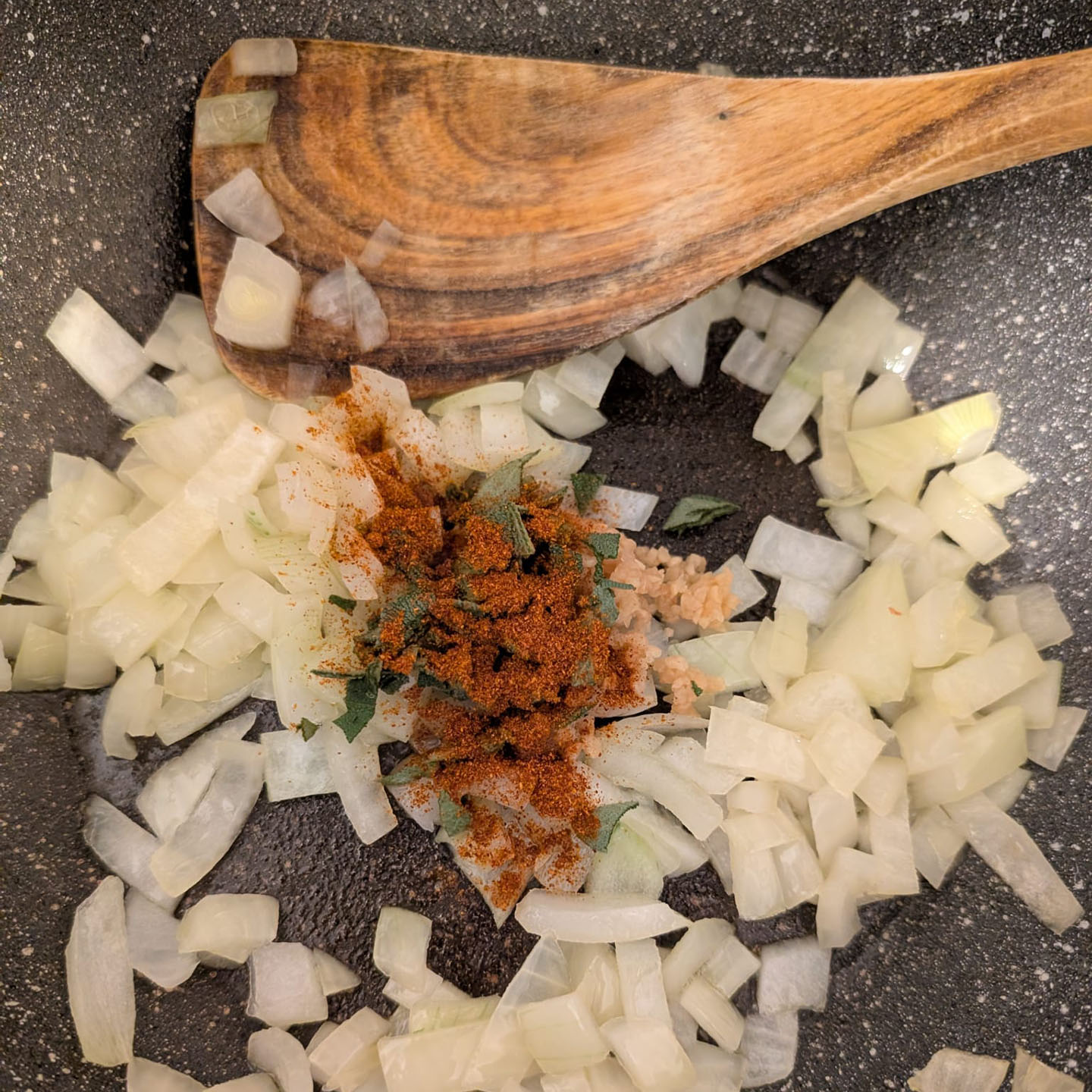Chopped onion and paprika in a pan
