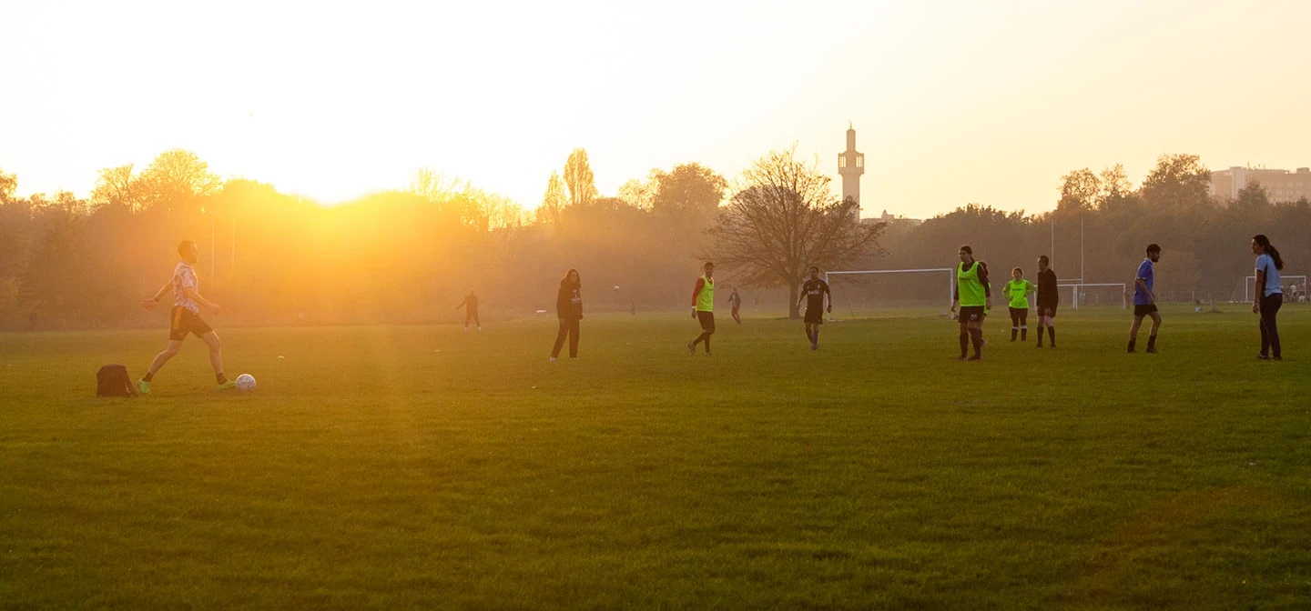 A football match at sunset