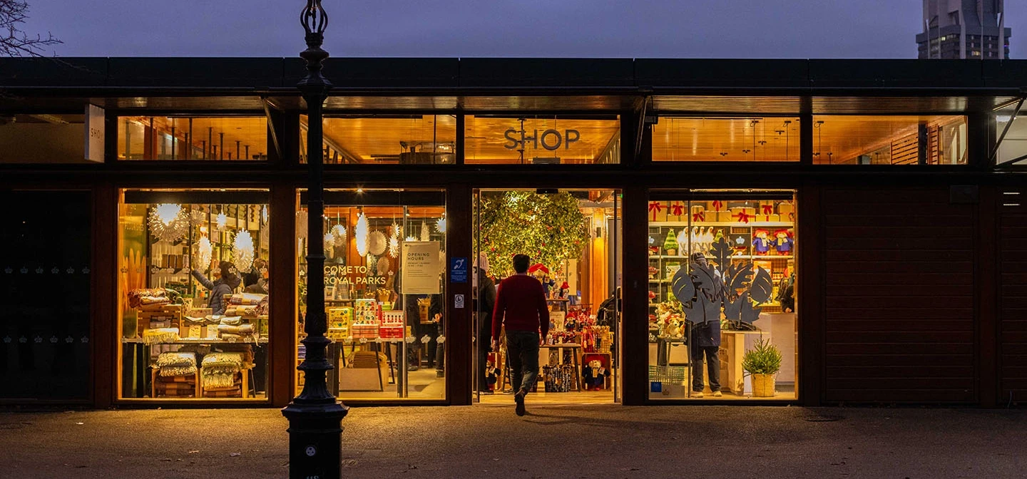 The Hyde Park Shop after dark in winter