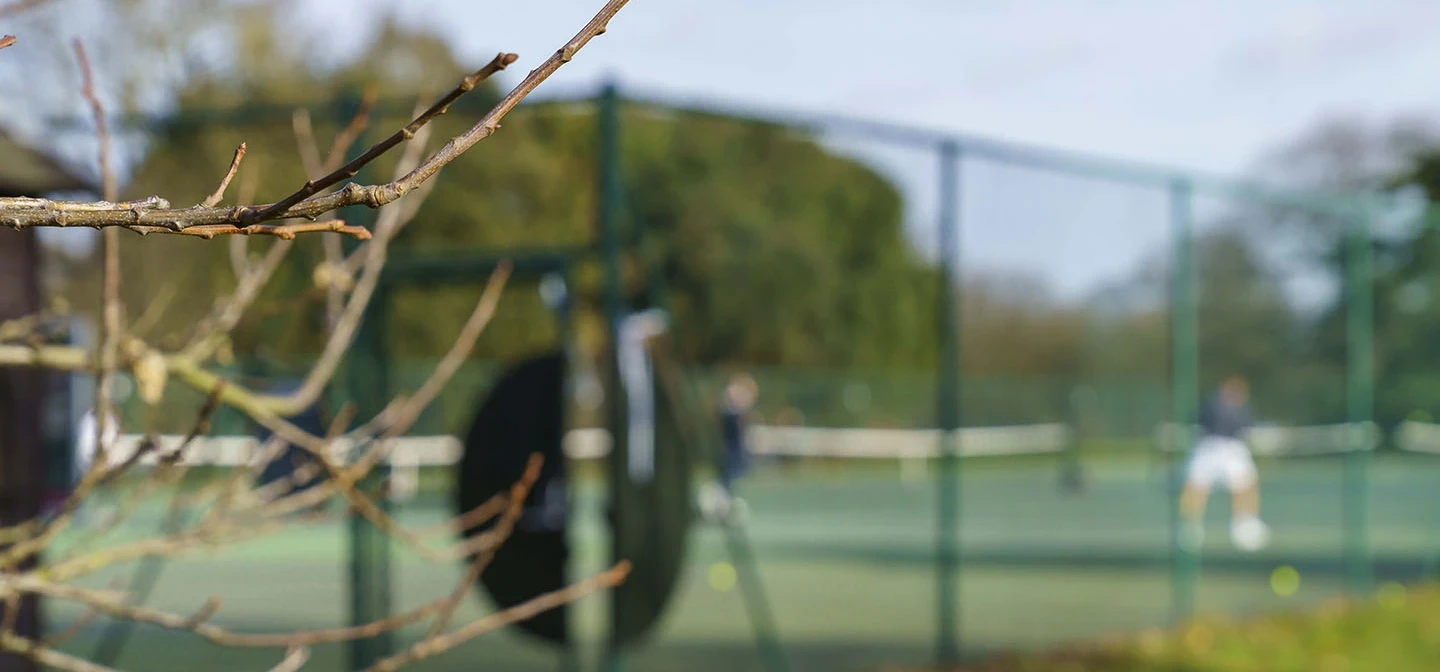 An out of focus shot of a tennis court