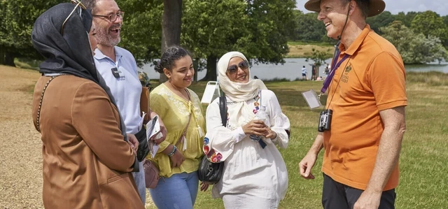 Volunteer Ranger talking to visitors in Richmond Park