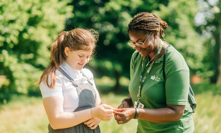 Royal Parks learning officer with student