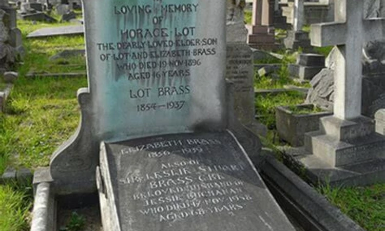 The Brass family tomb has been Grade II listed by Historic England for its unusual art nouveau-influenced style and sculptural panel.