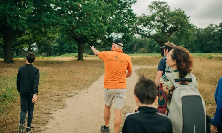 Volunteer Ranger takes people on a walk