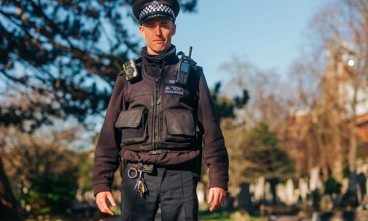 Police officer in Brompton Cemetery