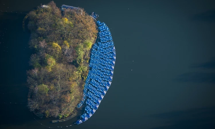 Aerial photo of pedalos and boats moored in the Serpentine