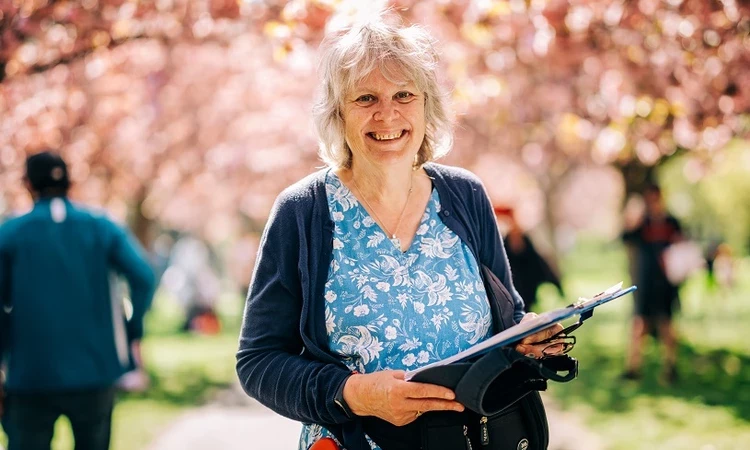 Smiling woman in the park in springtime