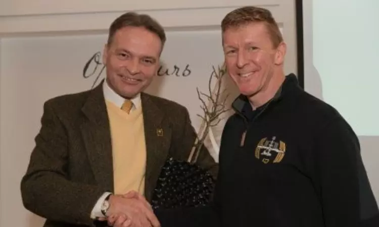 Bushy Park Assistant Park Manager Bill Swan holding the sapling with astronaut Tim Peake