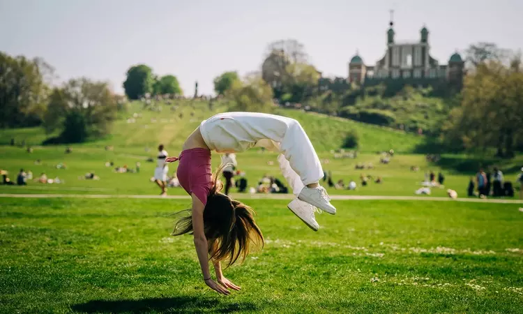 Girl performing a backflip
