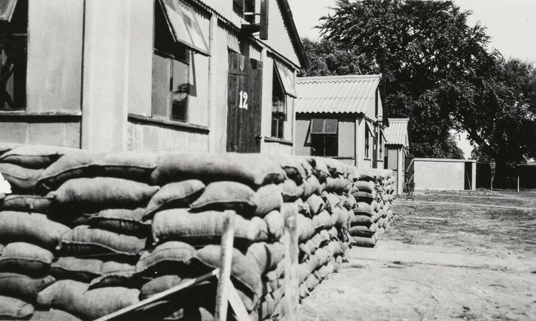 Brick buildings in Camp Griffiss with sandbags, Bushy Park