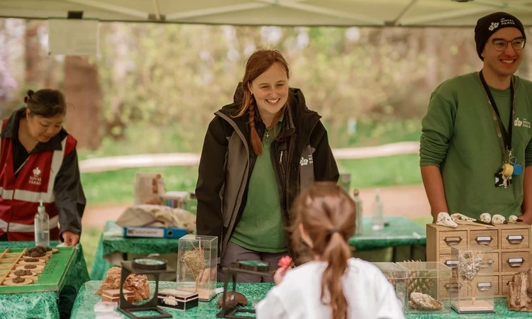 Members of the Help Nature Thrive team chatting to visitors