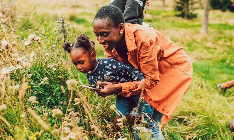 mother and child exploring nature