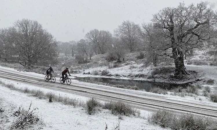 Cyclist on a snowy road
