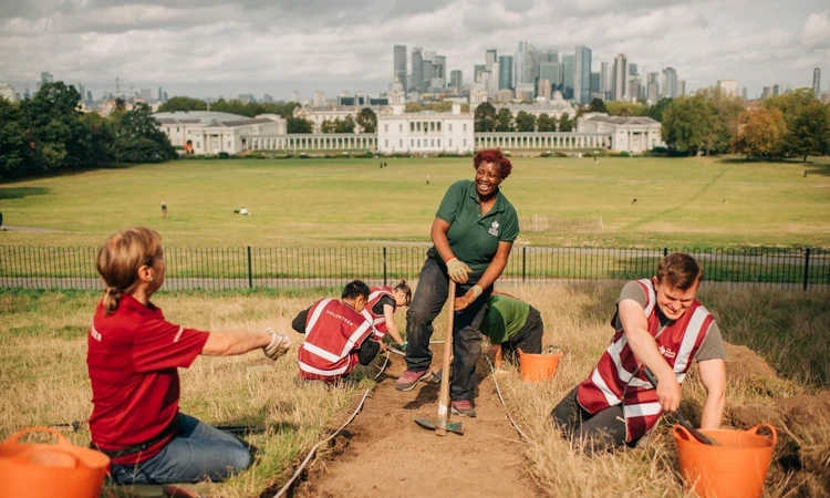 Volunteers dig an archaeological  trench in Greenwich park