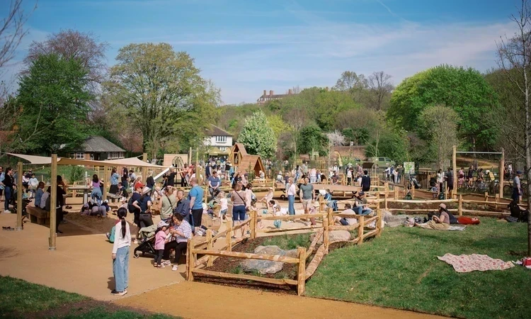 A busy playground on a sunny spring day