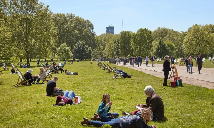 People relaxing in the sunshine
