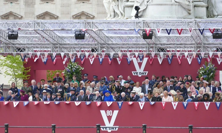 The Royal Family, World War Two veterans and dignitaries watching the parade