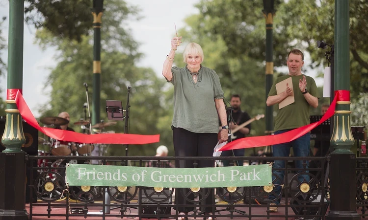 Cutting the ribbon on the newly-restored bandstand