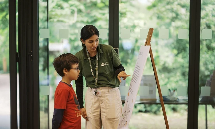 Community Engagement Officer Cassie talking to a young boy