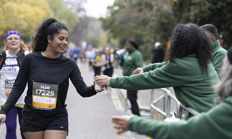Half Marathon volunteers handing out water to runners