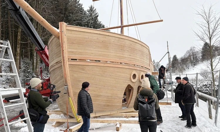 The wooden galleon under construction in the snow