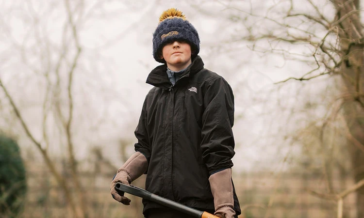 Green Futures student holding a garden fork