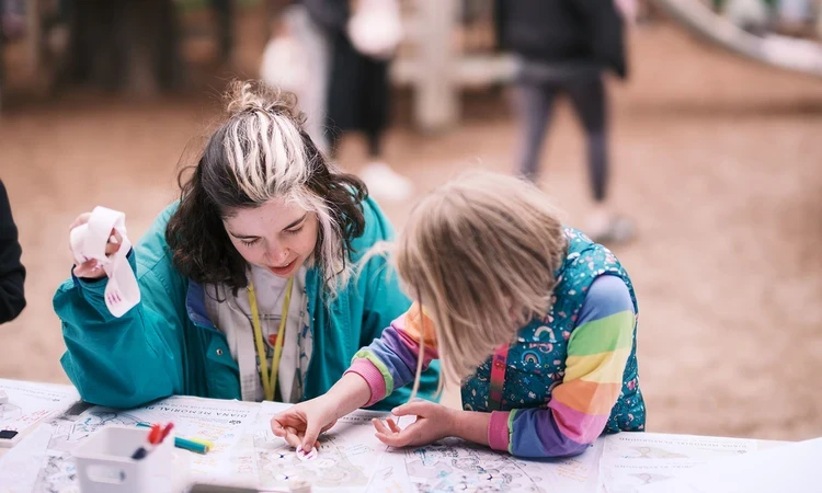 Youngsters with plans for the revised Diana, Princess of Wales Memorial Playground