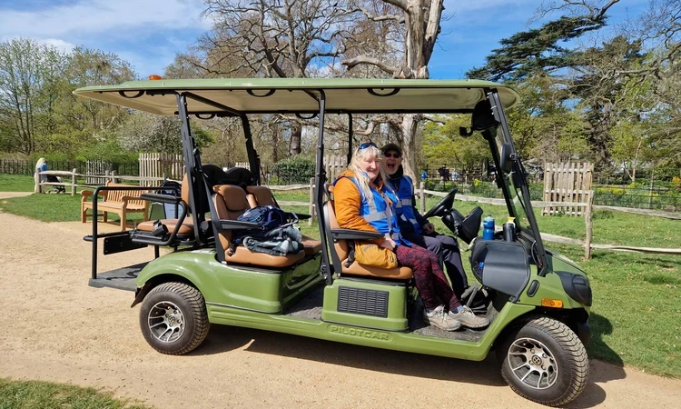 Volunteers driving the Bushy Park mobility buggy