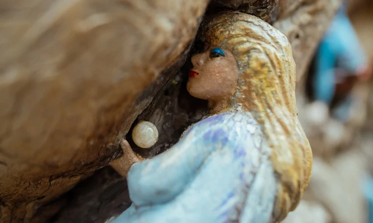 Close-up of a restored figure