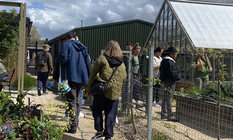 Group of visitors in the Ignatius Sancho community kitchen garden