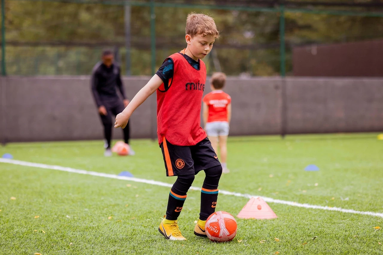 A boy at football training