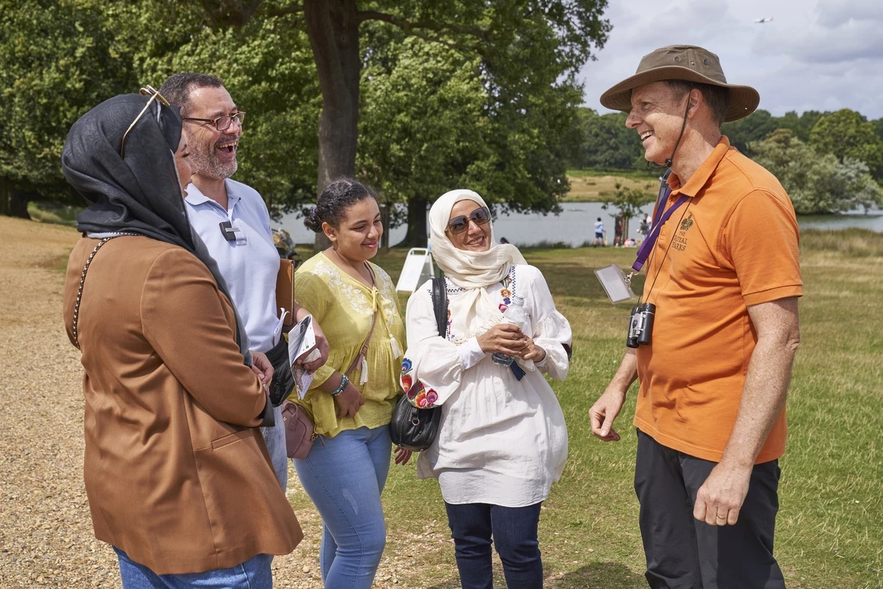 Volunteer Ranger talking to park visitors