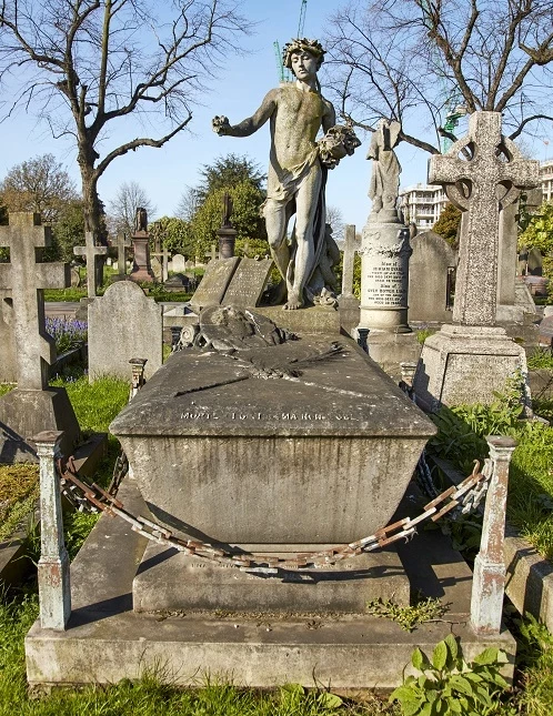 Barbe’s chest tomb is listed Grade II by Historic England for its sculptural and historic significance.