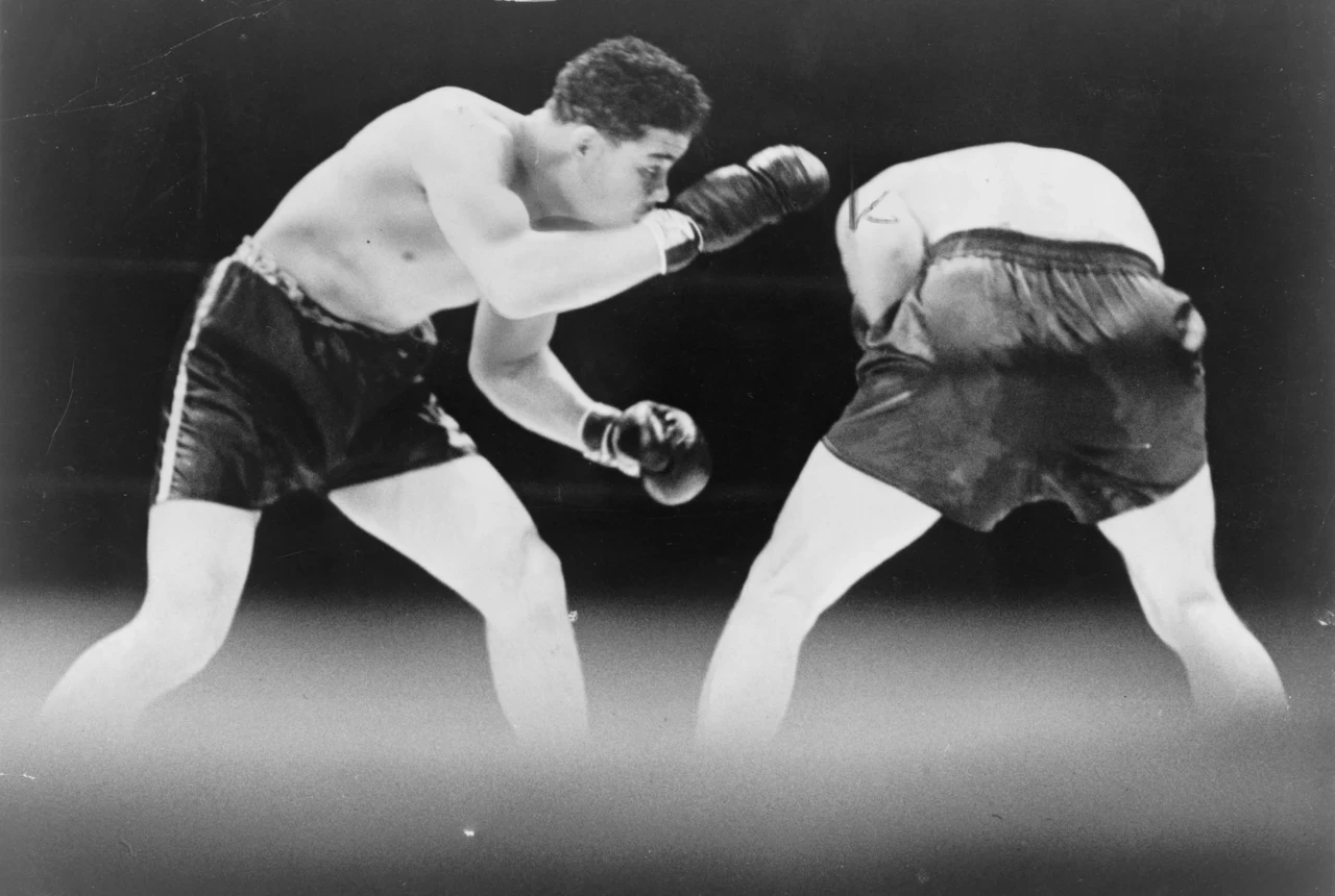 Joe Louis in the ring with Max Schmeling, 1936