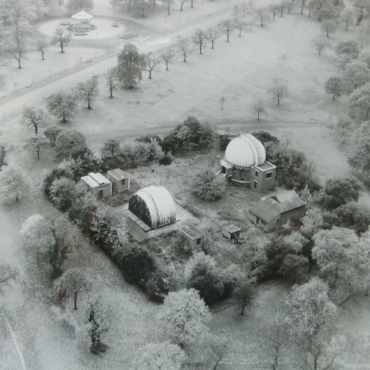 Aerial view of the Christie Enclosure in 1956 following the demolition of the Magnetic Observatory, which had stood close to the tree in the centre. The bandstand is visible top left.