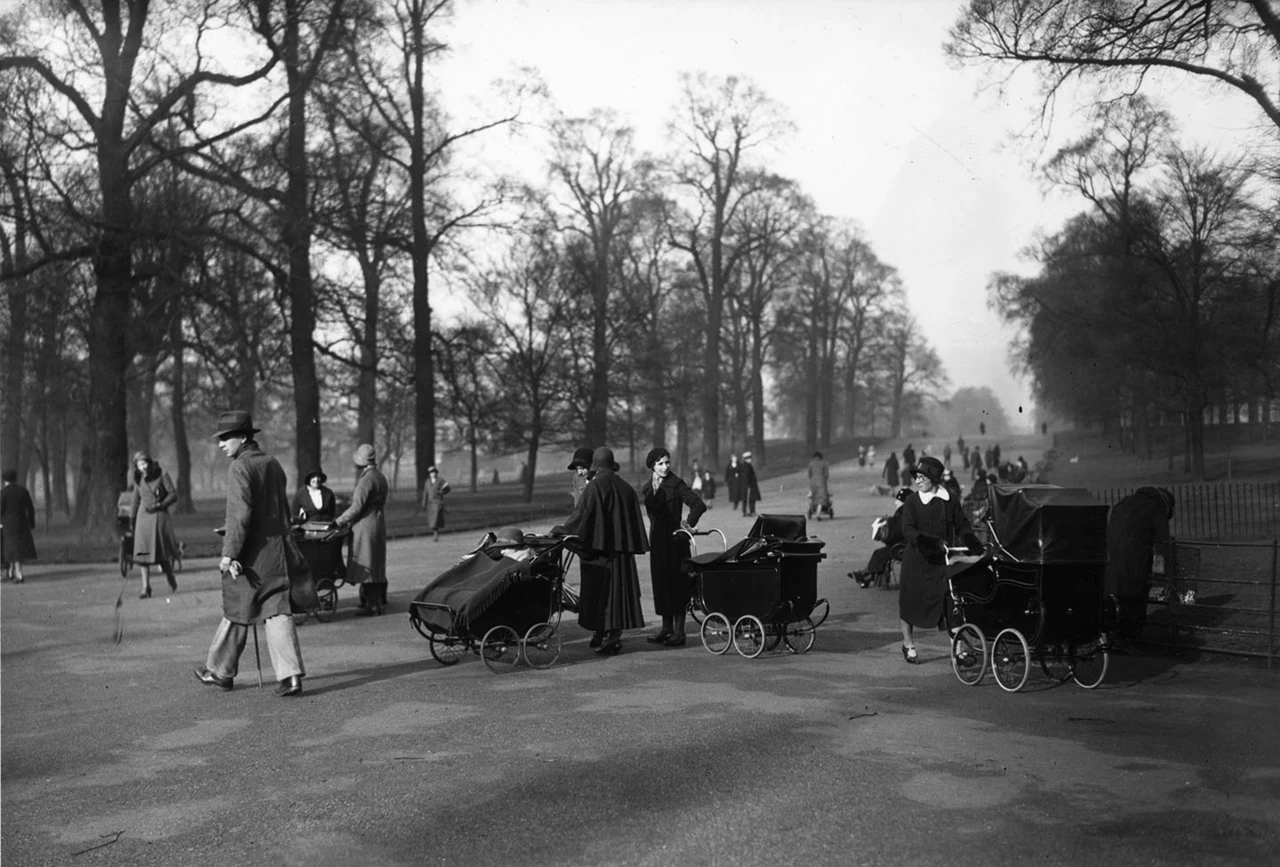 Nannies pushing prams in Kensington Gardens