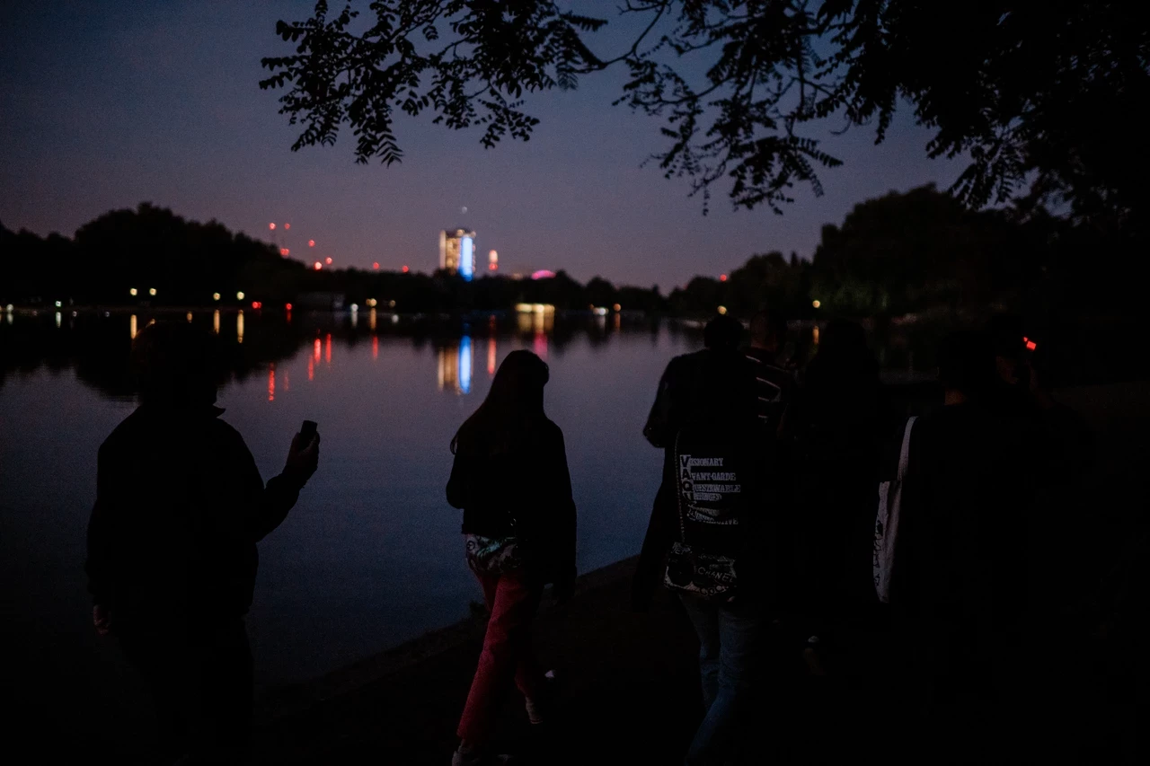 People walking outdoors in the night
