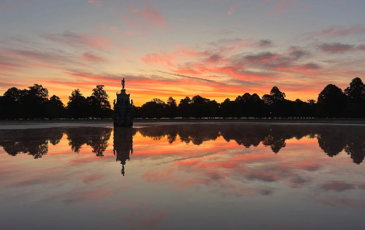 Diana Fountain and surrounding trees at sunrise